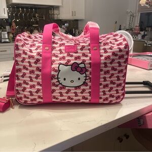 Hello kitty duffle bag with rollers